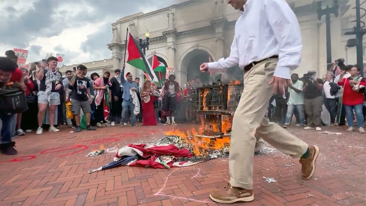 Patriot rescues fragment of Old Glory as pro-Hamas agitators burn American flag