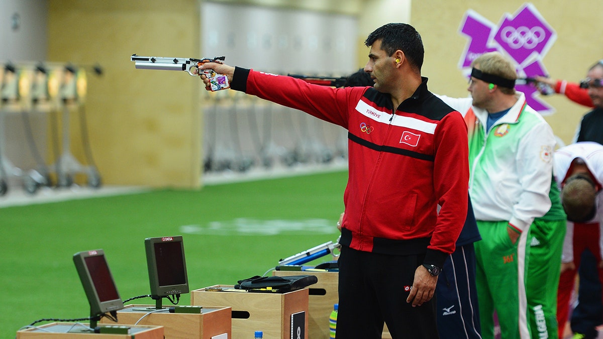 Turkish Olympic pistol shooter goes viral after nonchalant composure leads to silver medal: ‘Insane aura’