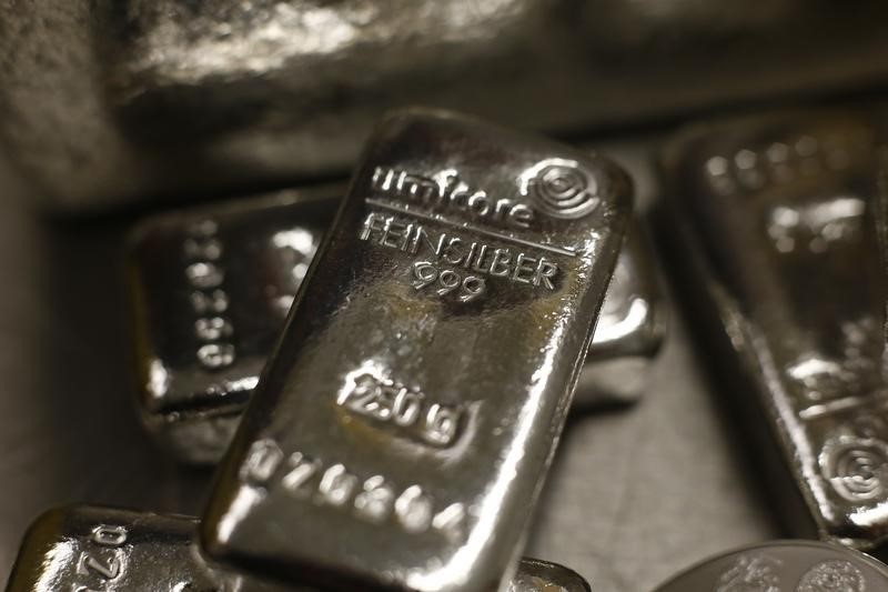 Silver prices ease after nearing 14-year high